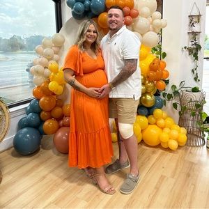 Women’s orange smocked v neck maternity dress
